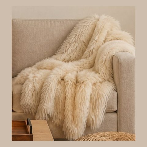 Cream faux fur throw