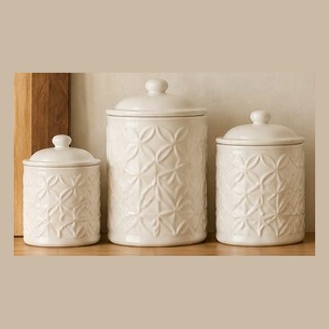Embossed ceramic canisters